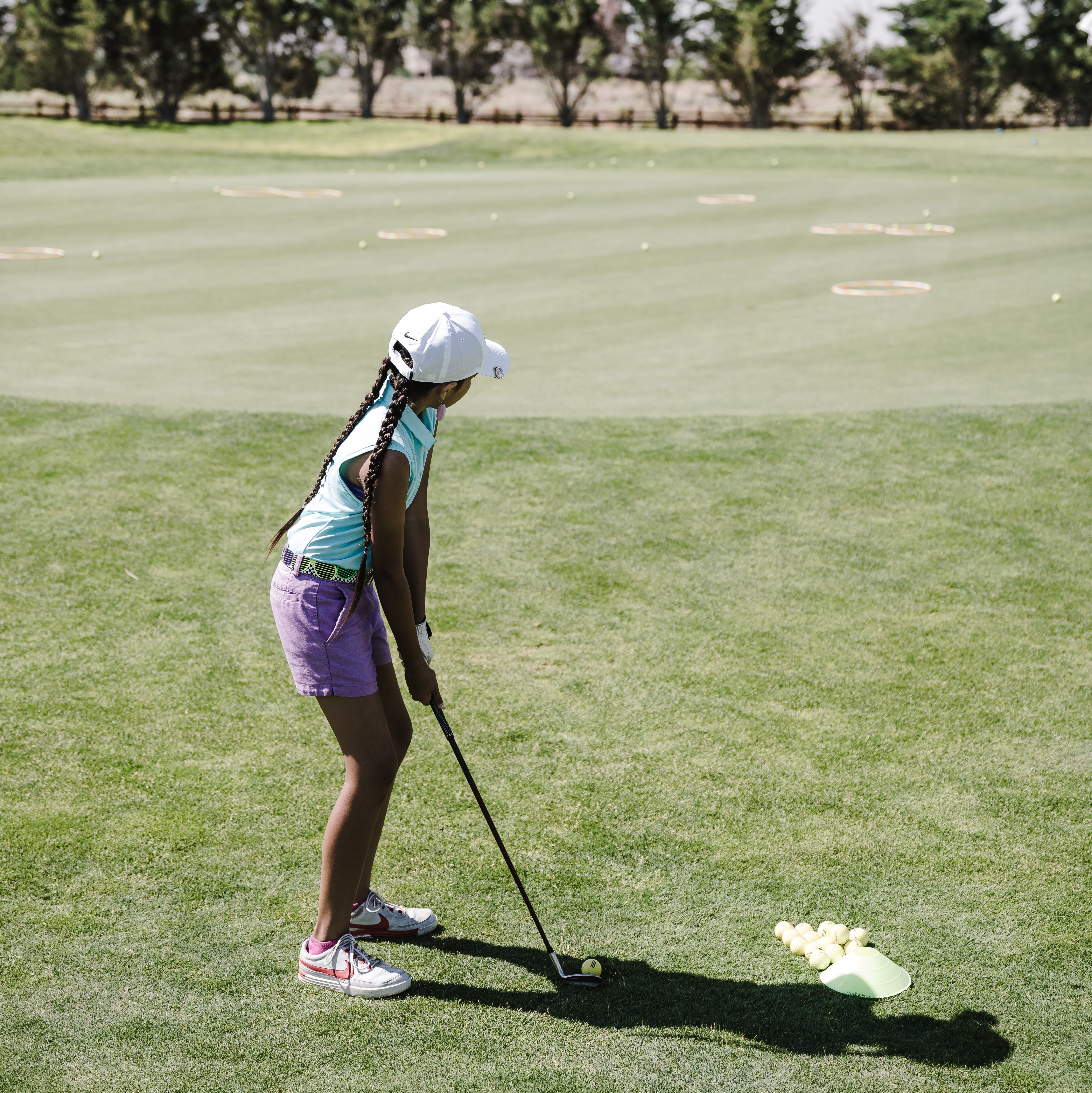 https://www.pexels.com/photo/girl-playing-golf-1325679/